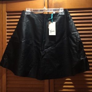 Yumi Faux Leather Lasercut Swing Skirt